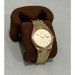 Vintage Seiko Quartz Watch 5Y23-8049 Gold Tone Champagne Dial Day Date. Runs
